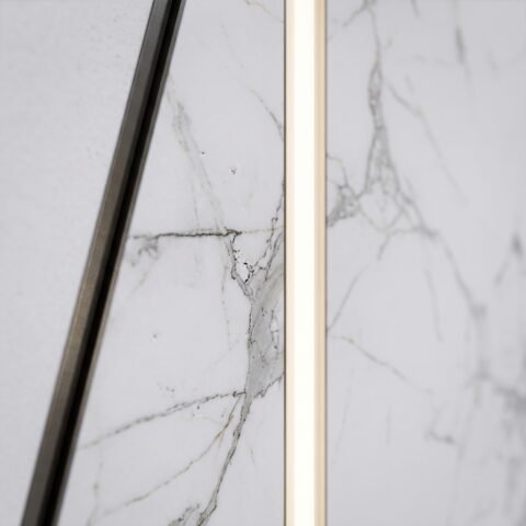 Tarkhan Door Double Hieghted Door with white marble finish, gray veining, vertical metallic accent and dark frame